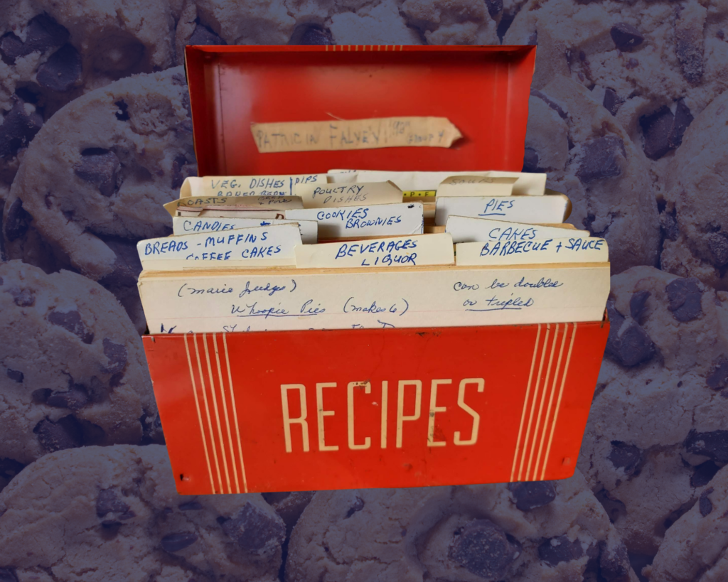 Image of an old recipe box full of vintage handwritten recipes.